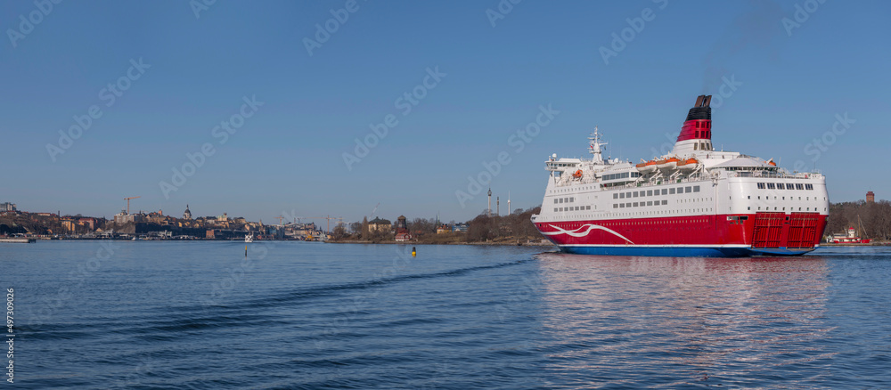 Cruise ferry from Finland arriving a sunny spring day in Stockholm