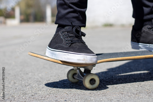 Two-foot close-up on a skateboard 