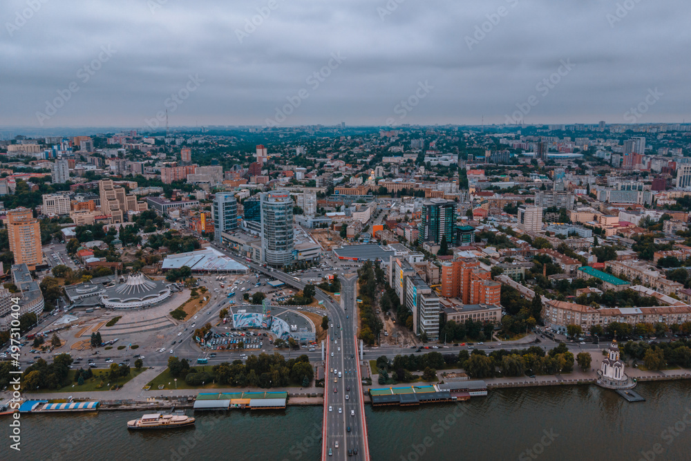 Fototapeta premium Dnipro, Ukraine. View of the central part of the city, the embankment of the Dnieper. Top view from a great height. Panoramic view of the city. Right bank of the city