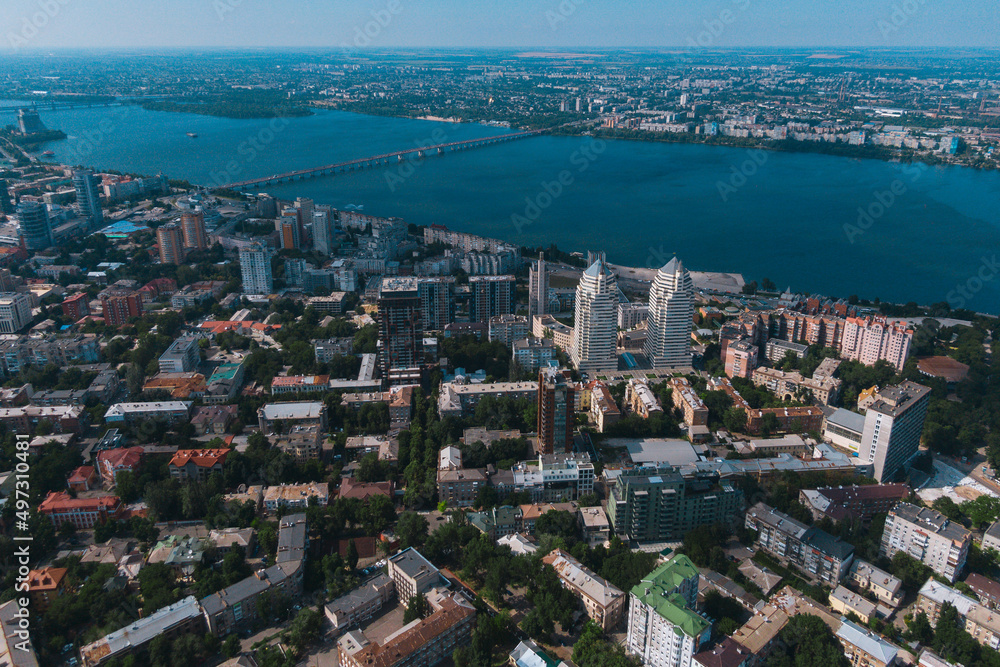 Dnipro, Ukraine. View of the central part of the city, the embankment of the Dnieper. Top view from a great height. Panoramic view of the city. Right bank of the city