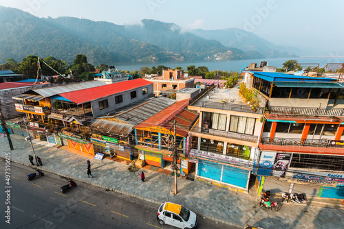 People walking down the street in the early morning, Pokhara, Nepal