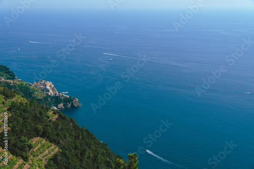 View from distance of the area Liguria, rocky beach, paradise on earth Province of La Spezia, Beautiful mountain north of Italy. Summer day time.