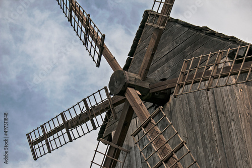 Wooden old mill. Medieval mill. Wooden building
