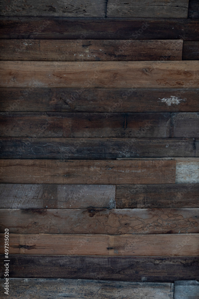 ฺBackground and textured of old wooden slats stacked together. for wall background. ฺBackground and textured of old wooden slats stacked together. for wall background.