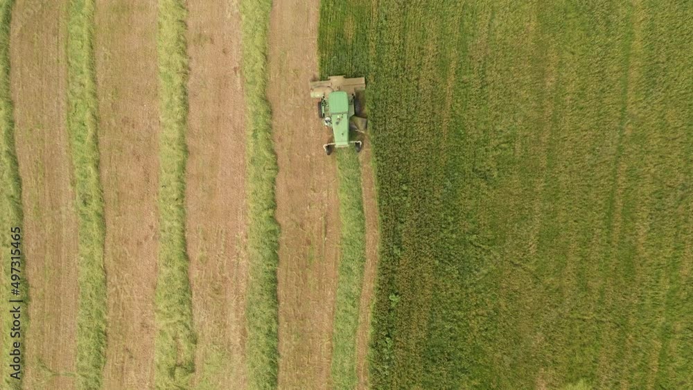 Combine harvester mowing Wheat, Aerial view Combine harvester mowing Wheat, Aerial view