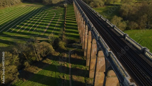 Ouse Valley Viaduct, London to Brighton line, Sussex in England. Aerial tilt-up descendent  photo