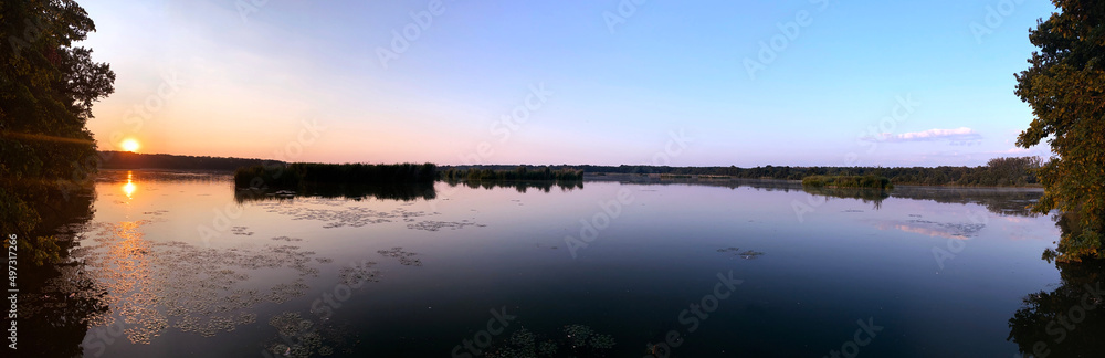 Panorama of Lake on Sunset with Trees