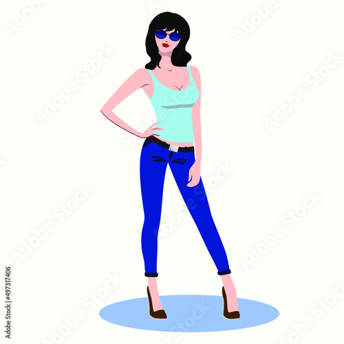 A young brunette girl in a blue tank top, blue jeans on her belt and dark goggles stands coquettishly