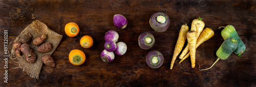panoramic Fresh colorful radish turnip rutabagas roots at farmers market, heirloom varietal vegetables photo