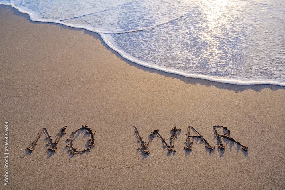 Fototapeta premium writing in the sand no war