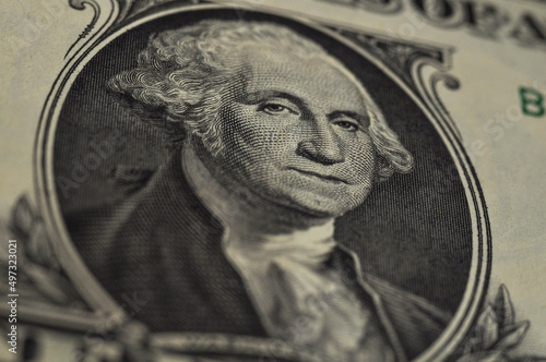 A close-up of George Washington on a US dollar bill. President's view