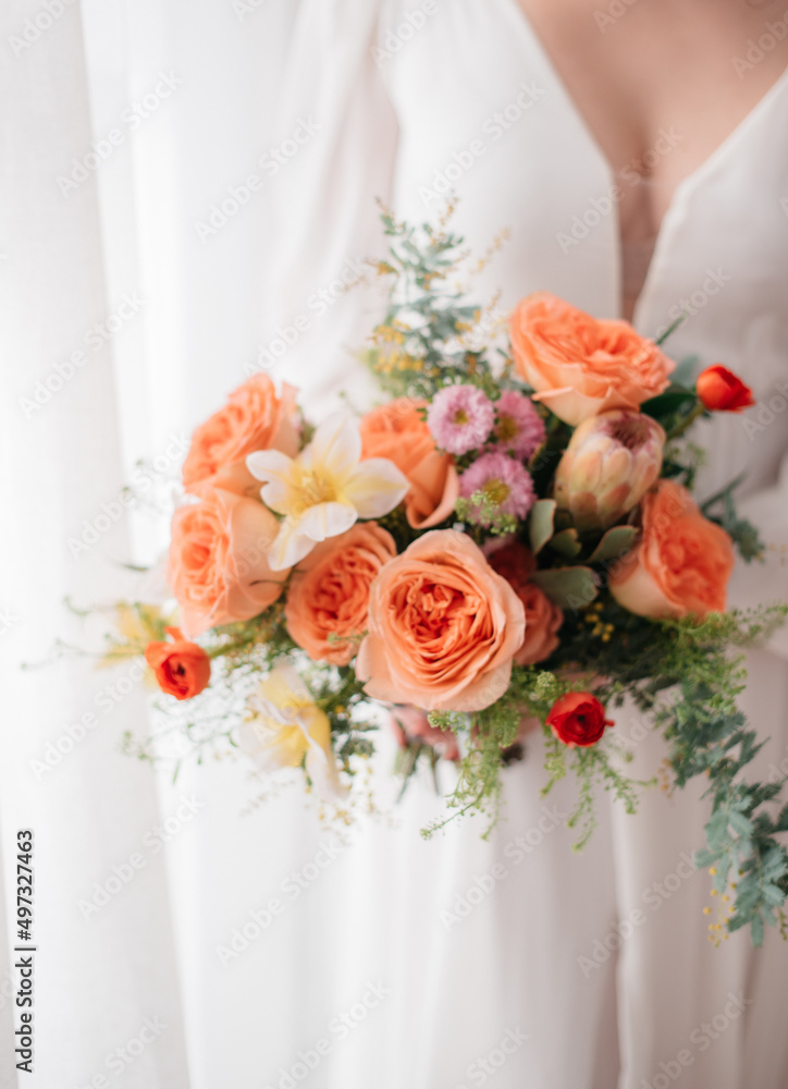 wedding bouquet in the hands of bride wedding bouquet in the hands of bride