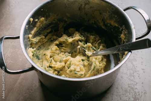  Mashed potatoes with dill in a saucepan. Stuffing for pies and dumplings. High quality photo