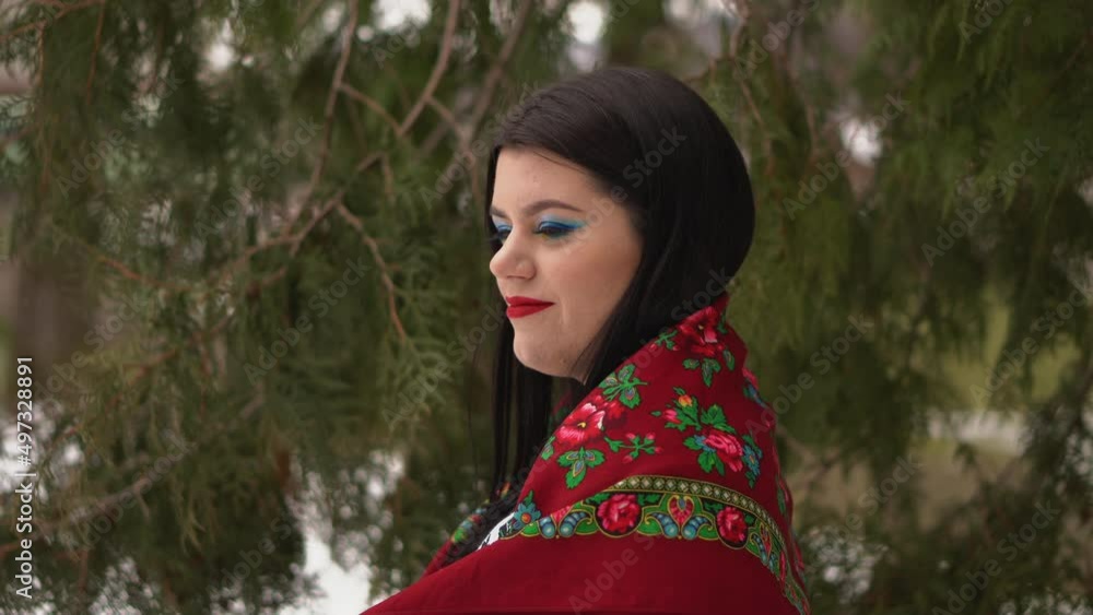 Ukrainian brunette girl in an embroidered shirt walks. Ukrainian national dress. Ukrainian brunette girl in an embroidered shirt walks. Ukrainian national dress.