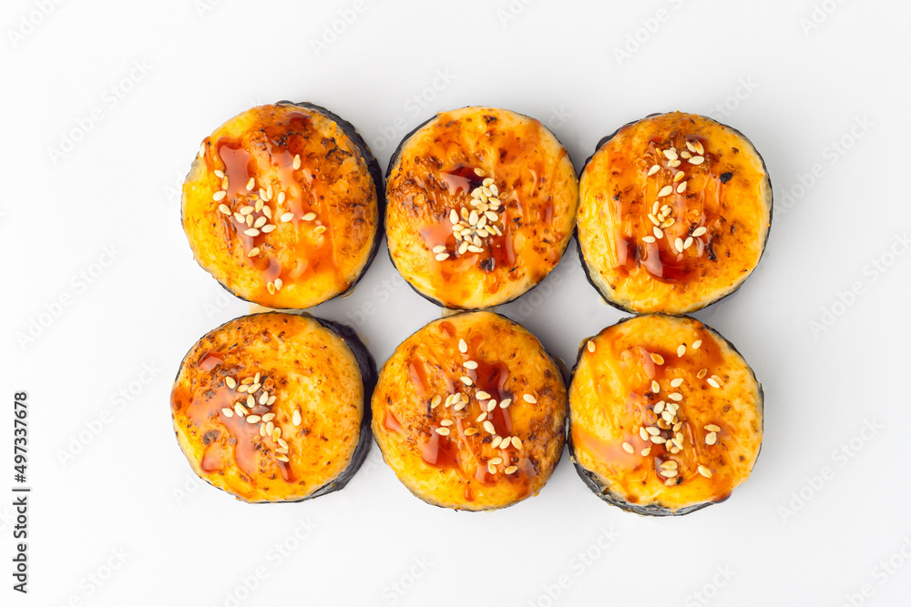 Rolls on a white background, rolls and sushi, sushi with different fillings Rolls on a white background, rolls and sushi, sushi with different fillings