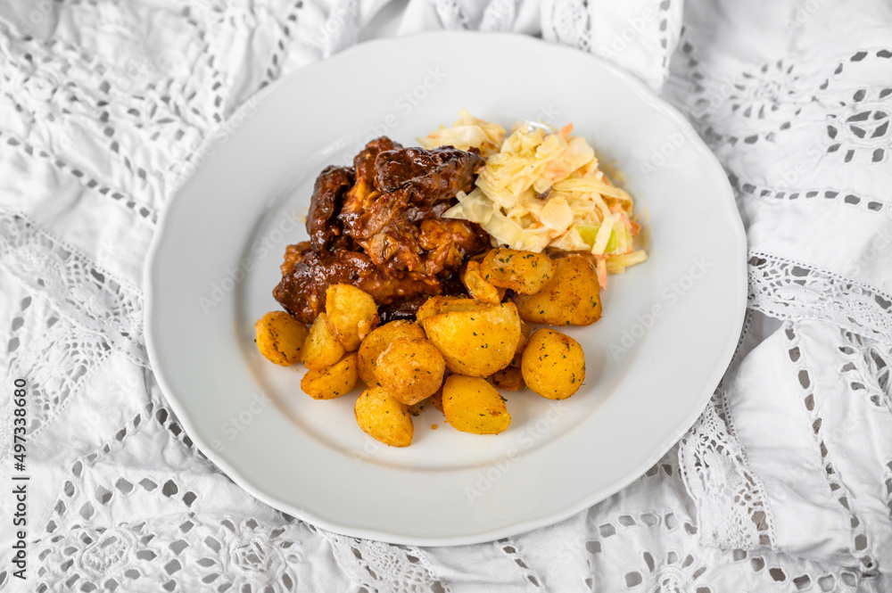 Baked sliced turkey meat in wild gypsy sauce, fried potato and salad coleslaw. Baked sliced turkey meat in wild gypsy sauce, fried potato and salad coleslaw.