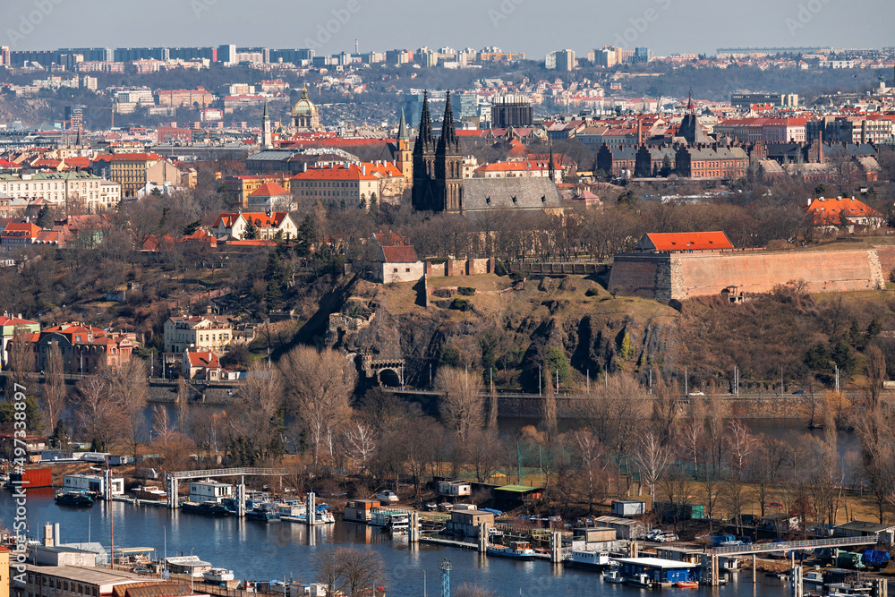Vysehrad rock, church and fortress ,river and building and houses on background in Prague.