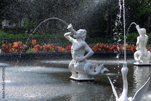 Forsyth Park Fountain Triton Statue with Shell Horn in Savannah, Georgia, USA. photo