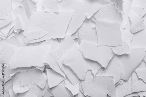 Empty white paper pieces as a background.