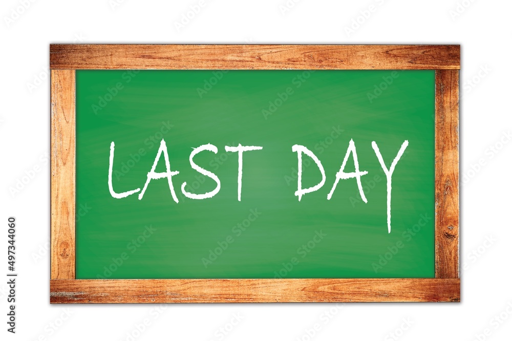 LAST DAY text written on green school board. LAST DAY text written on green school board.