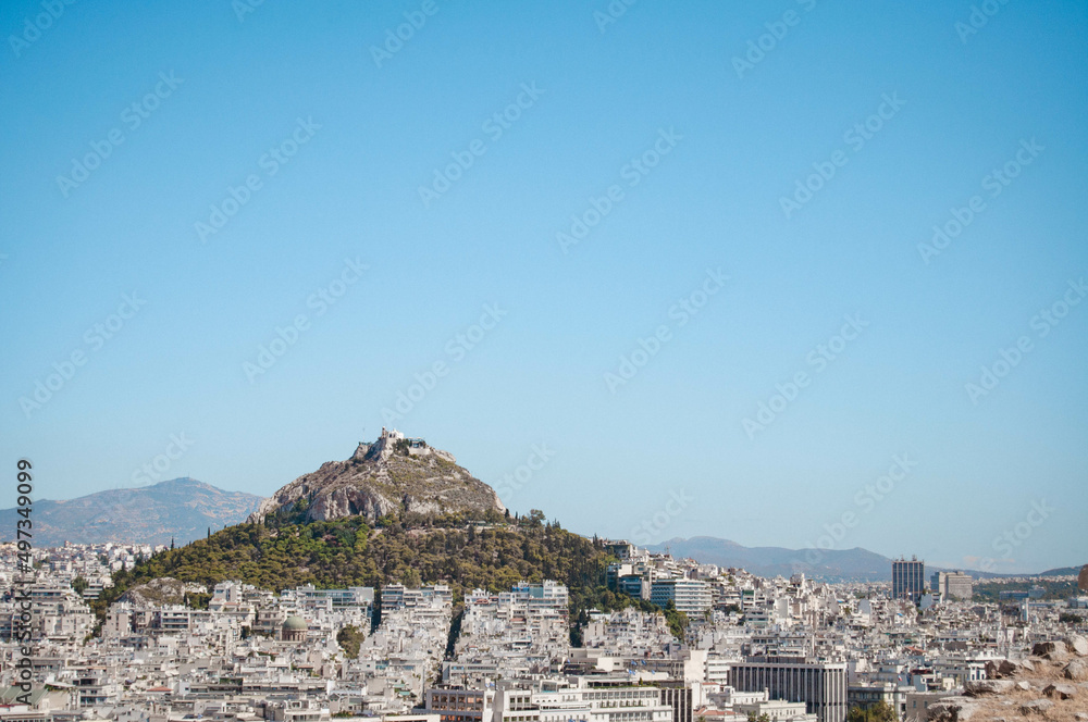 View of Athens city buildings and Lycabettus Hill, Greece