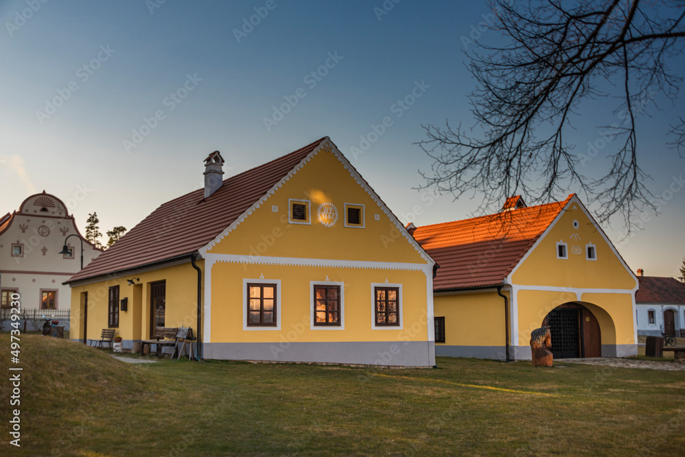 Holasovice village in spring sunny color evening with old folks houses