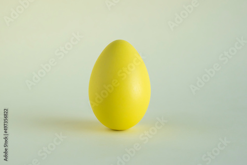 Golden egg on background. Still life. Isolated. Easter.