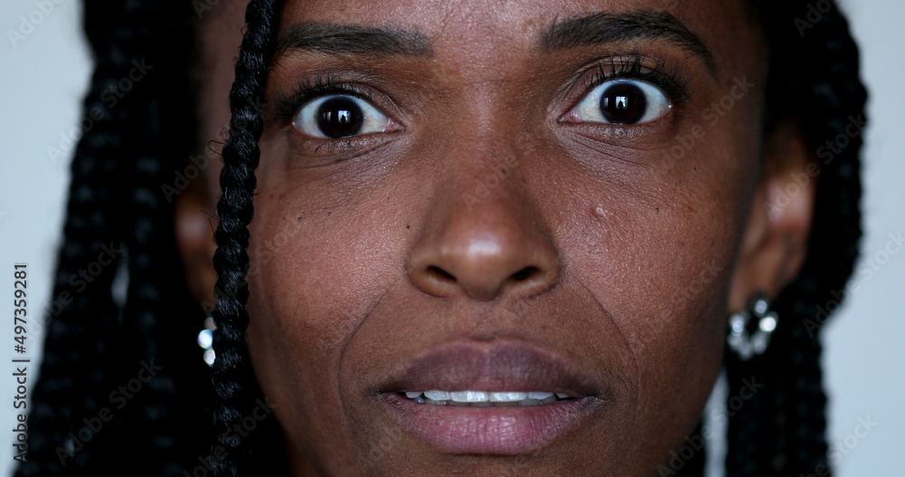 Paranoid African woman feeling scared and teror. Portrait black lady overreaction emotion Paranoid African woman feeling scared and teror. Portrait black lady overreaction emotion