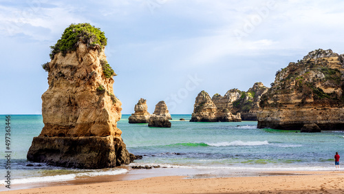 View of Praia de Dona Ana beach with cliffs and sand in Lagos, Algarve, Portugal