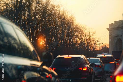 traffic. cars caught in the crowd. photo taken in the evening. people in traffic returning from work photo