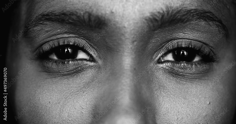 Naklejka premium Black and white African ethnicity woman eyes, monochrome macrz