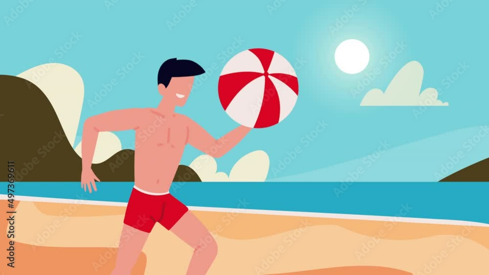 male vacationer playing with balloon on the beach male vacationer playing with balloon on the beach