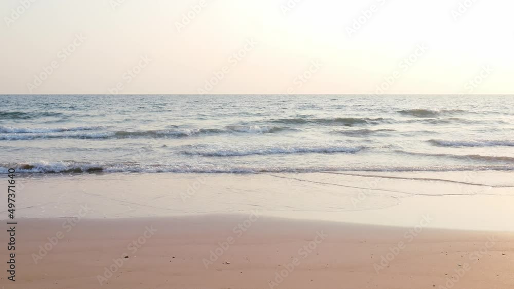 Tropical beach view,Sea waves seamless loop on the beautiful sand beach. Tropical beach view,Sea waves seamless loop on the beautiful sand beach.