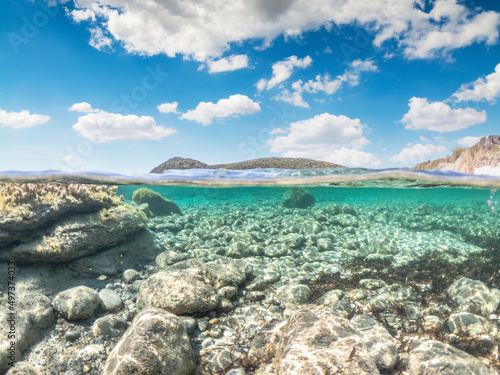 Split underwater view of La Speranza rocky seabed © Gabriele Maltinti