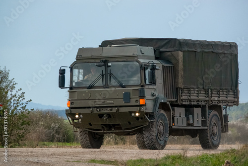 british large MAN SV 4x4 army haulage support vehicle in action on a military exercise photo