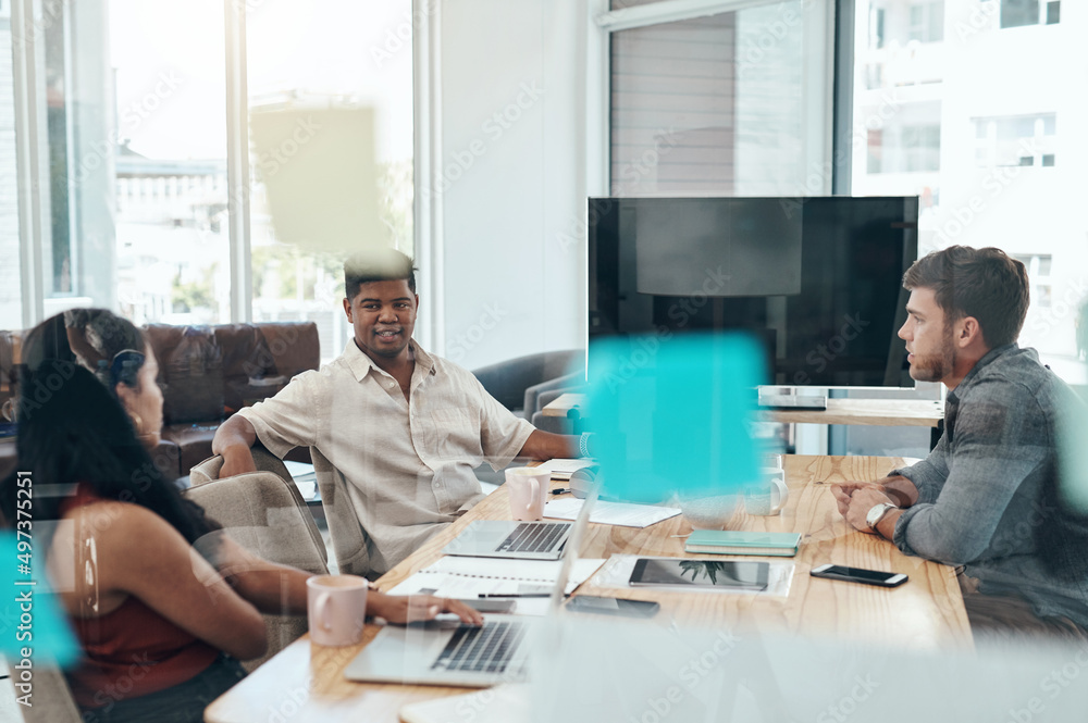 Getting together to decide on the way forward. Shot of a group of businesspeople having a discussion in an office. Getting together to decide on the way forward. Shot of a group of businesspeople having a discussion in an office.