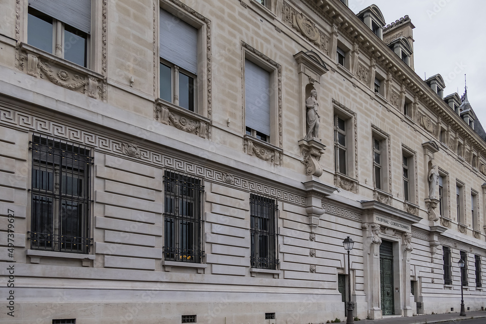 Architectural details of old buildings in Paris: The Criminal Court of Paris (Tribunal Correctionnel) at 14 Quai Goldsmiths. Paris. France.