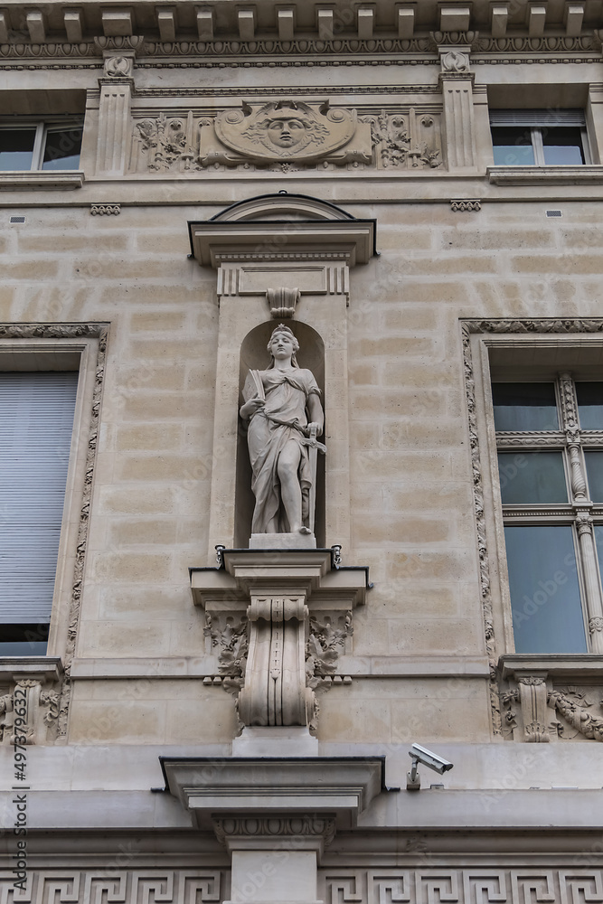 Architectural details of old buildings in Paris: The Criminal Court of Paris (Tribunal Correctionnel) at 14 Quai Goldsmiths. Paris. France.