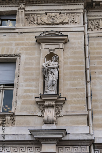 Architectural details of old buildings in Paris: The Criminal Court of Paris (Tribunal Correctionnel) at 14 Quai Goldsmiths. Paris. France. photo