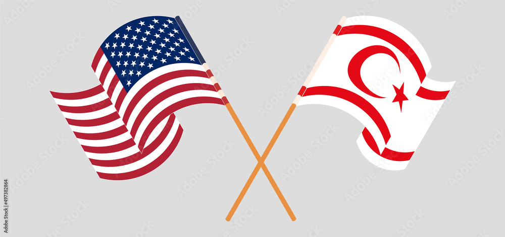 Crossed and waving flags of the USA and Northern Cyprus