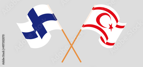 Crossed and waving flags of Finland and Northern Cyprus
