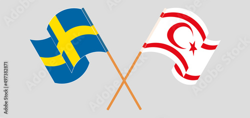 Crossed and waving flags of Sweden and Northern Cyprus