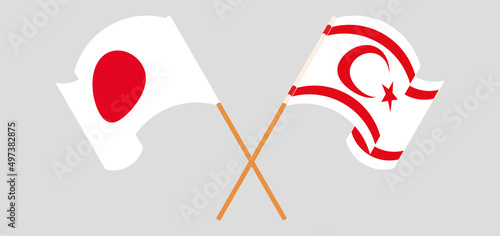 Crossed and waving flags of Japan and Northern Cyprus