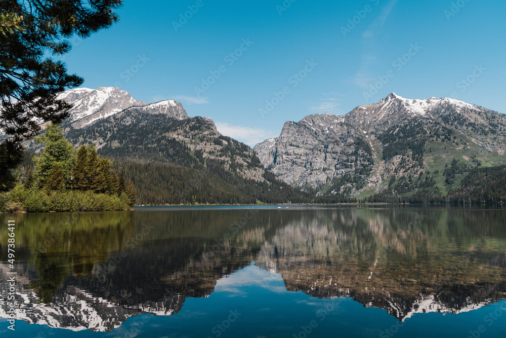 A mountain reflection on Taggart Lake in Grand Teton National Park
