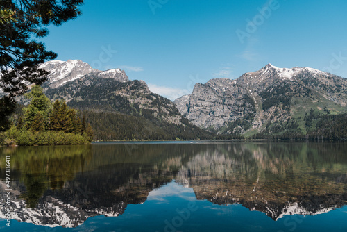 Fototapeta Naklejka Na Ścianę i Meble -  A mountain reflection on Taggart Lake in Grand Teton National Park