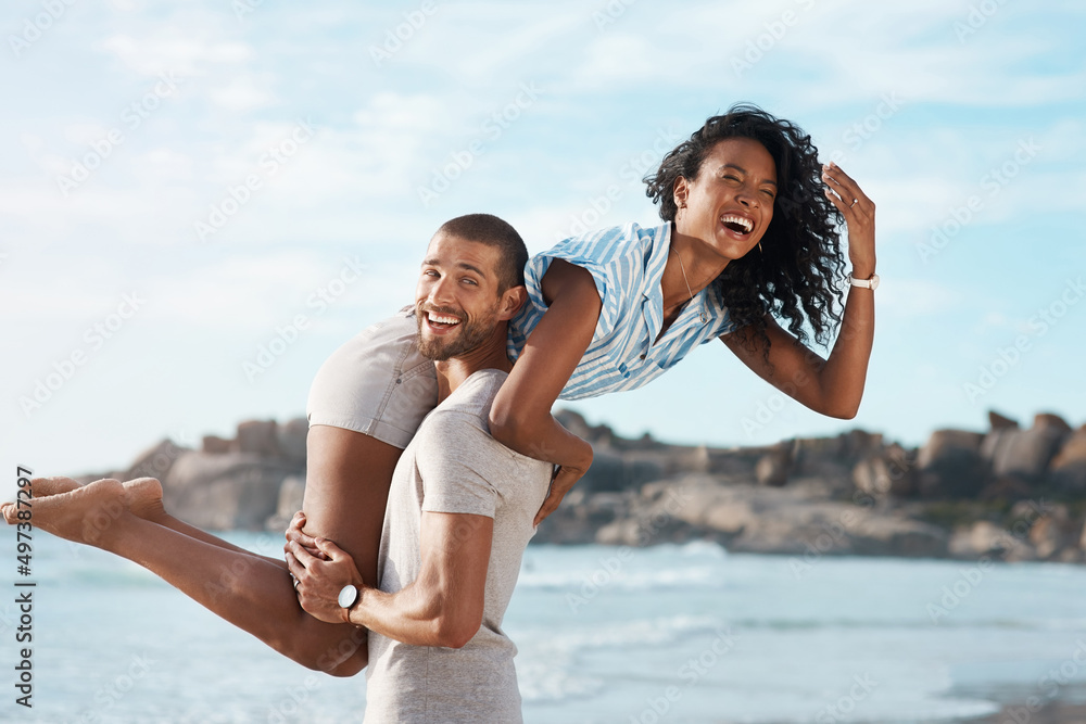 Summer fuels a sense of endless fun. Shot of a young couple enjoying some quality time together at the beach. Summer fuels a sense of endless fun. Shot of a young couple enjoying some quality time together at the beach.