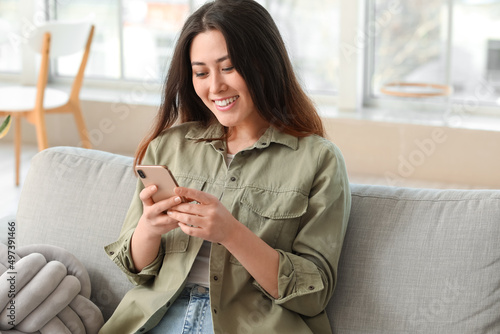 Beautiful young Asian woman...