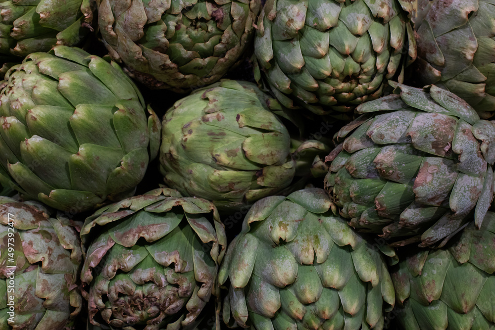 Artichokes in the supermarket backdrop Artichokes in the supermarket backdrop