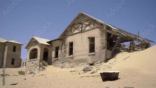 Abandoned city of Kolmanskop in Namibia. Ancient city, sand in desert of Africa.
