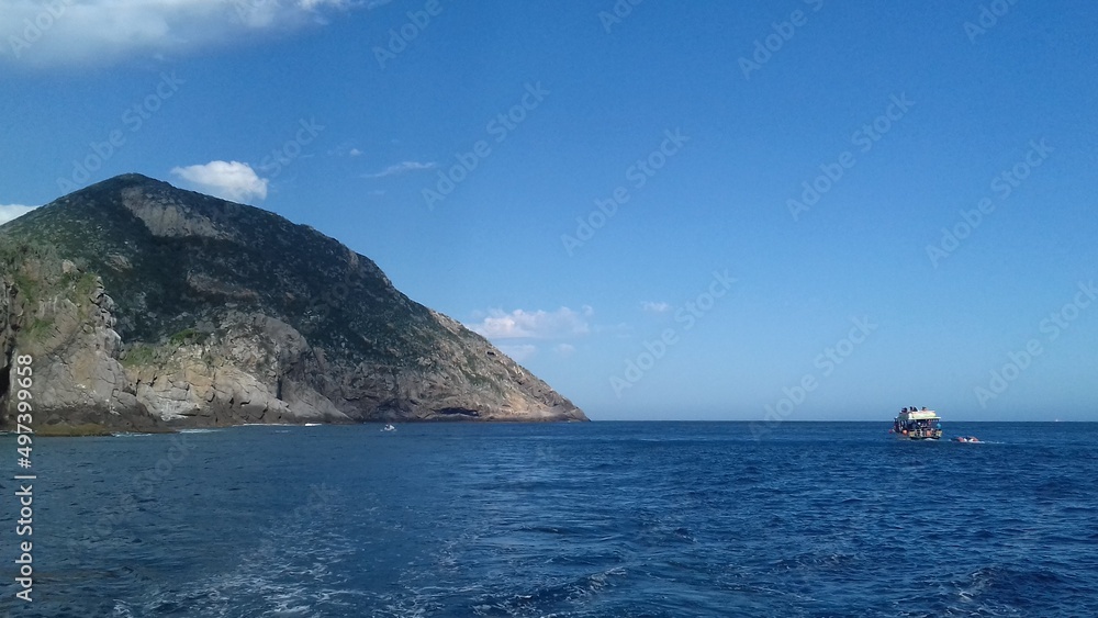 BLUE SKY AT THE SEA